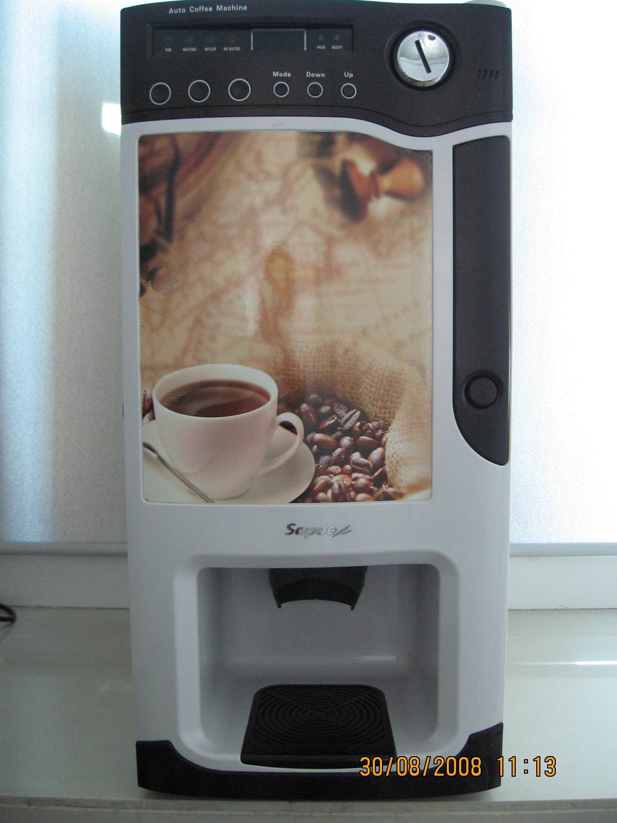 coffee vending machine with brace an LED lights photo